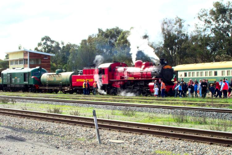 Upon arrival in Pinjarra the passengers swarm to the front of the Wizards Express to get their photo taken with this popular locomotive              � Photo by Doug Bell
